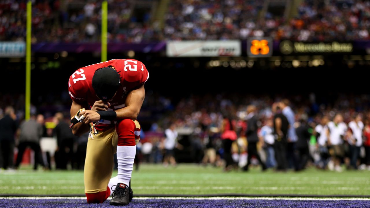 C.J. Spillman of the San Francisco 49ers kneels in the endzone prior to the start of Super Bowl XLVII against the Baltimore Ravens.