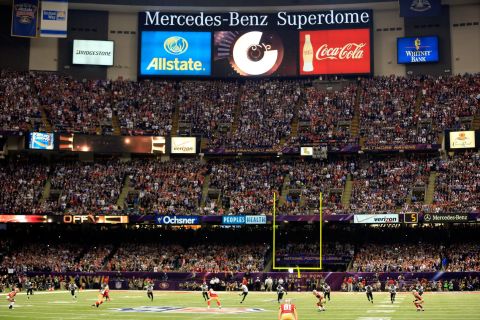 Justin Tucker of the Baltimore Ravens kicks the ball to the San Francisco 49ers to start Super Bowl XLVII.