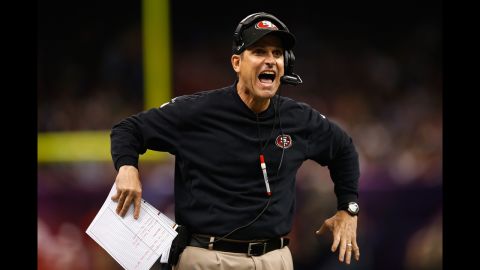 49ers head coach Jim Harbaugh reacts to a play in the first quarter.