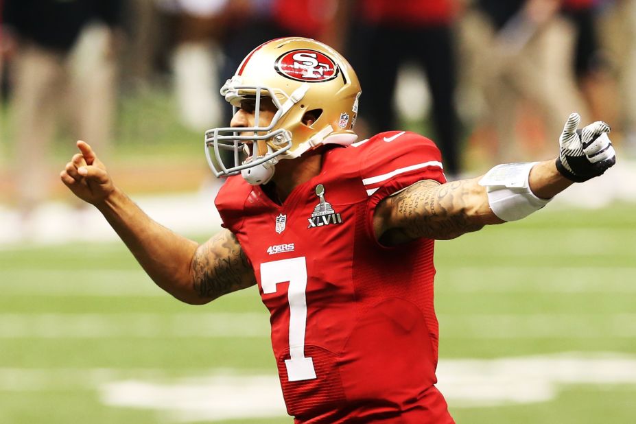 49ers quarterback Colin Kaepernick directs his teammates before a snap in the first quarter.