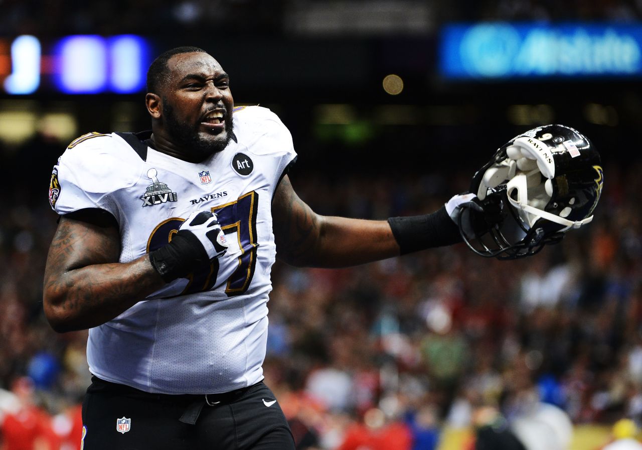Arthur Jones of the Baltimore Ravens exults as he walks off of the field at halftime.