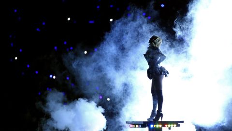 Beyonce appears on a rising platform during the halftime show.