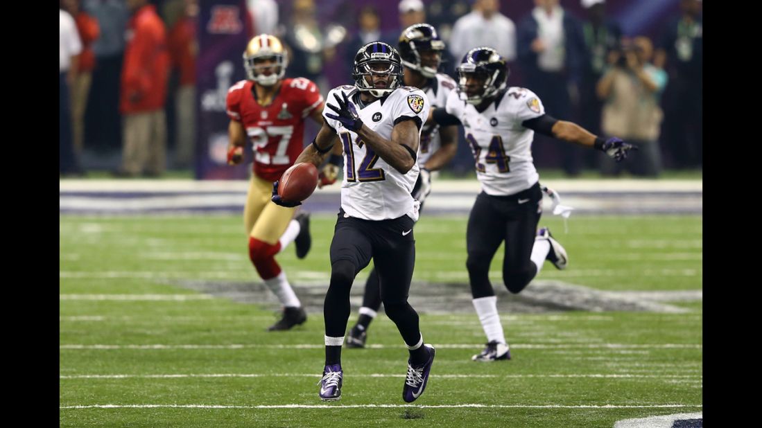 Jacoby Jones of the Baltimore Ravens runs the second-half kickoff back 108 yards for a touchdown.
