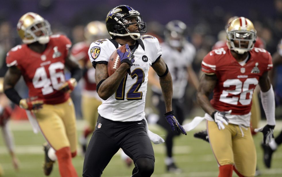Jacoby Jones of the Baltimore Ravens returns the second-half kickoff 108 yards for a record-tying touchdown.