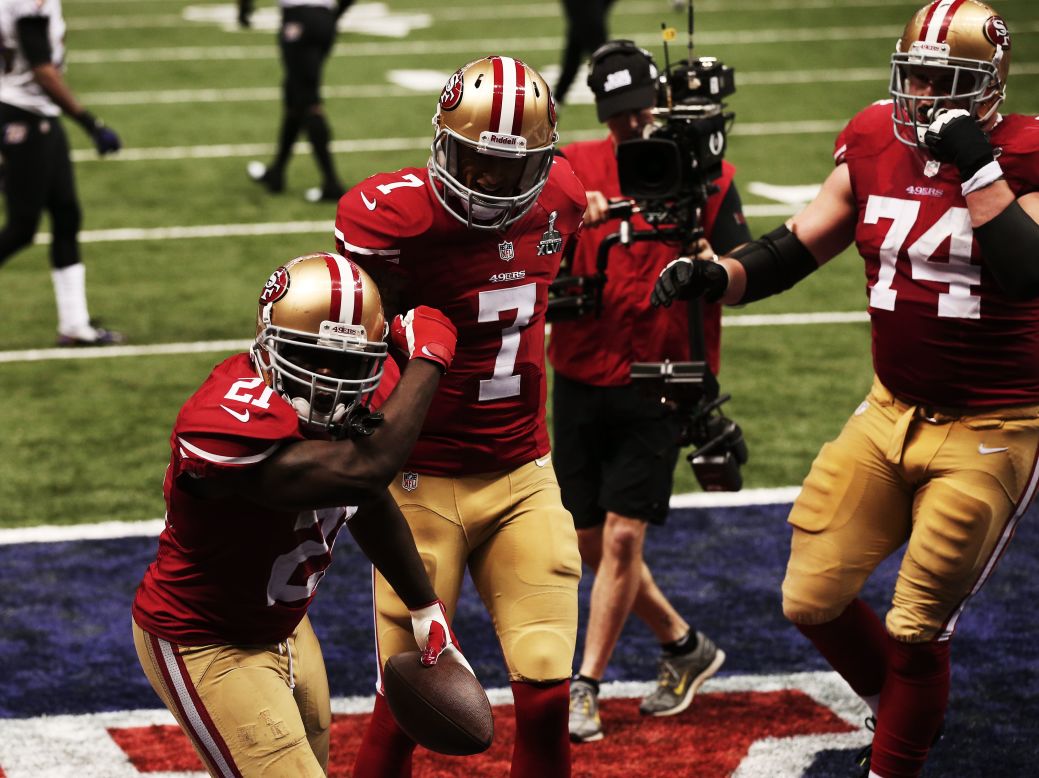Frank Gore of the 49ers celebrates his 6-yard rushing touchdown in the third quarter.