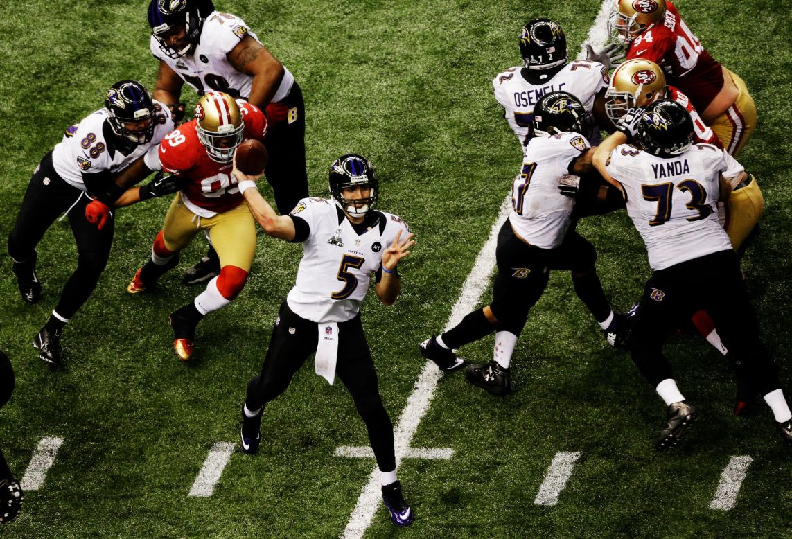 Joe Flacco of the Baltimore Ravens throws a pass in the fourth quarter against the San Francisco 49ers.