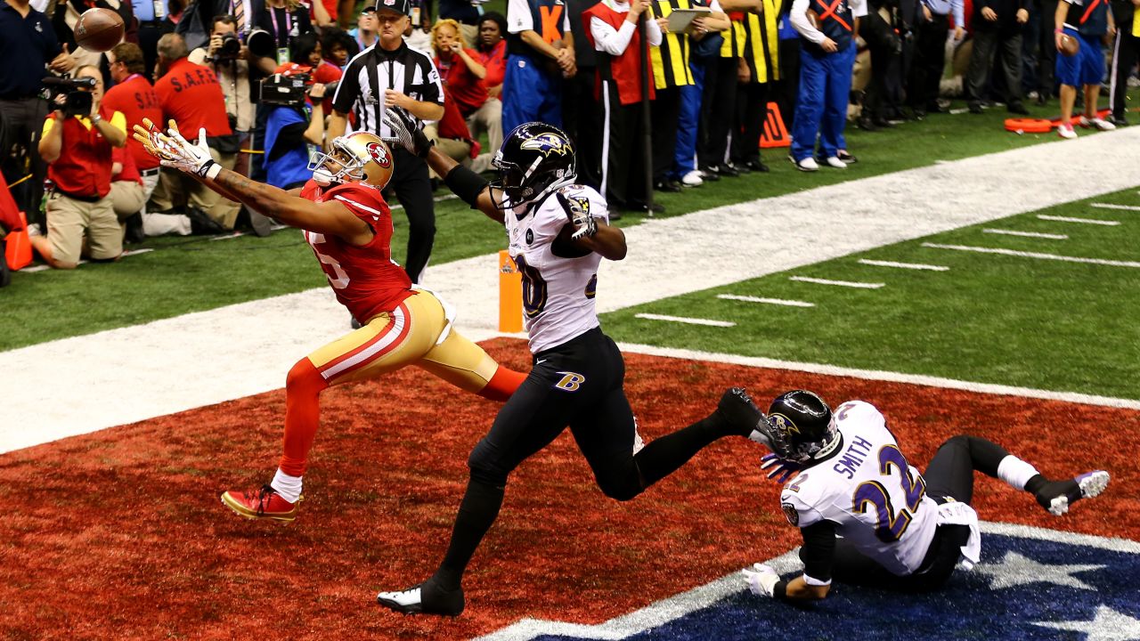Michael Crabtree of the San Francisco 49ers fails to make a catch in the end zone late in the fourth quarter against Ed Reed of the Baltimore Ravens.