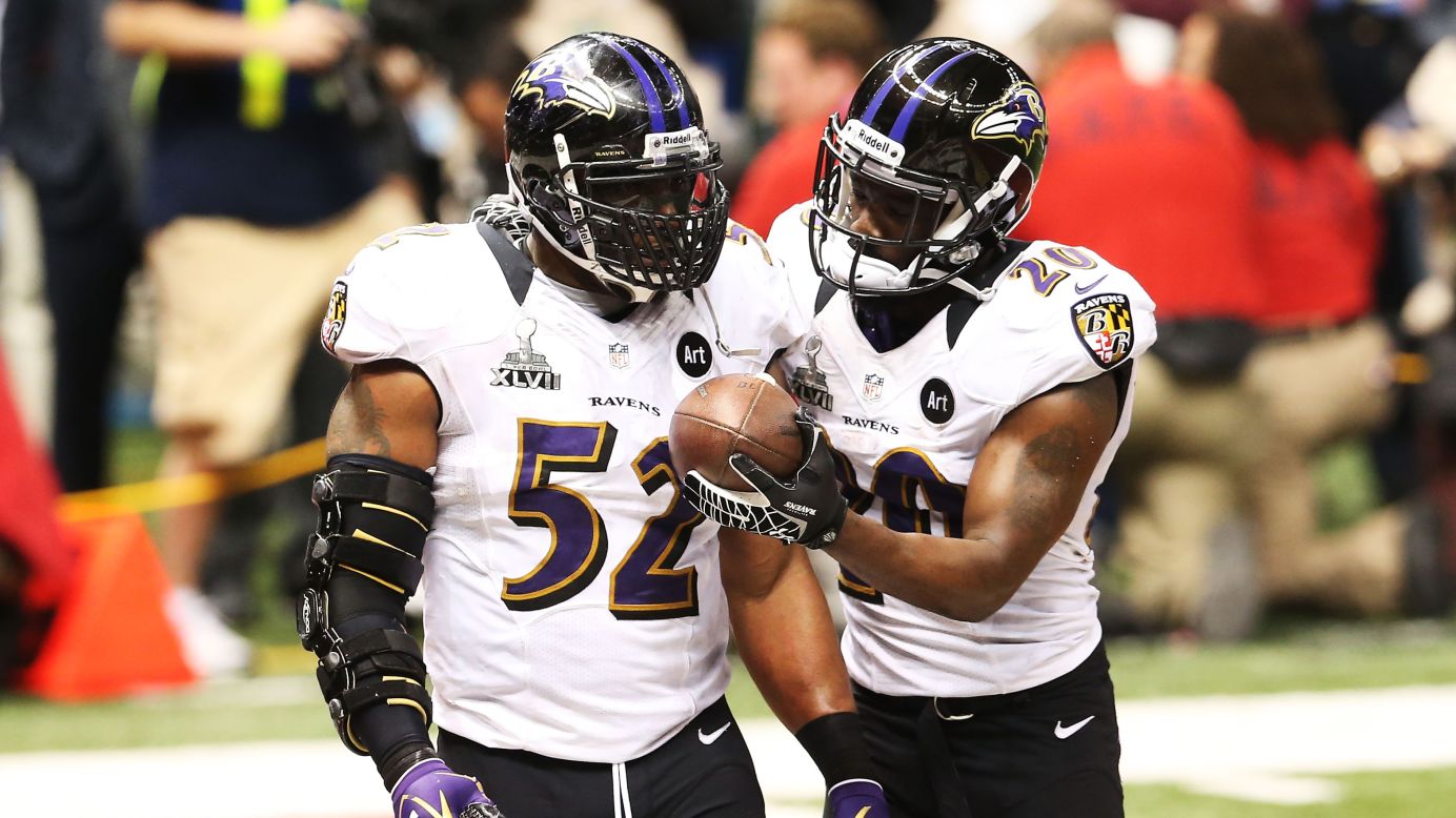 Ray Lewis, left, and Ed Reed of the Baltimore Ravens celebrate after the San Francisco 49ers couldn't convert on a fourth down play in the final two minutes of the fourth quarter.