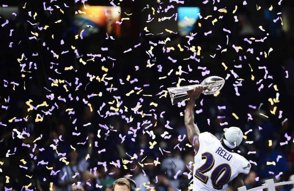 Ed Reed of the Baltimore Ravens hoists the Vince Lombardi Trophy after the win.
