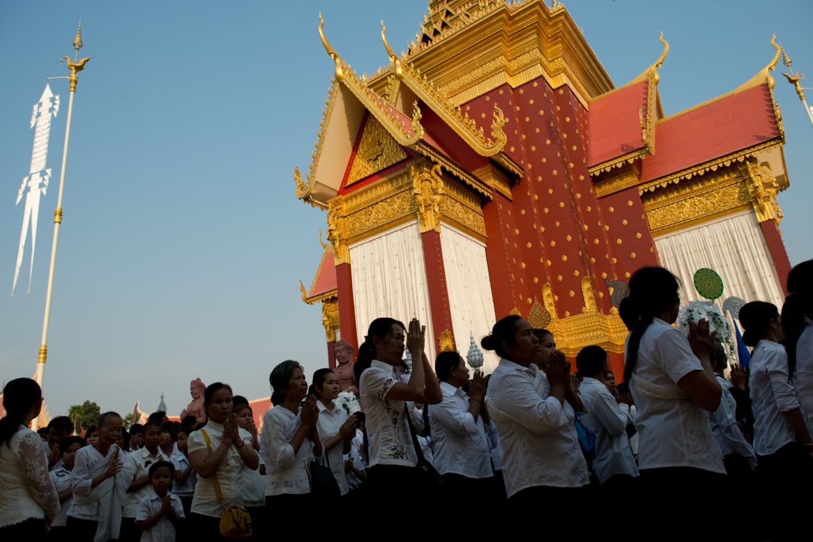 Thousands of Cambodians enter the crematorium where a coffin bearing the remains of Cambodia's late king Norodom Sihanouk is placed near the Royal Palace in Phnom Penh on Monday. 