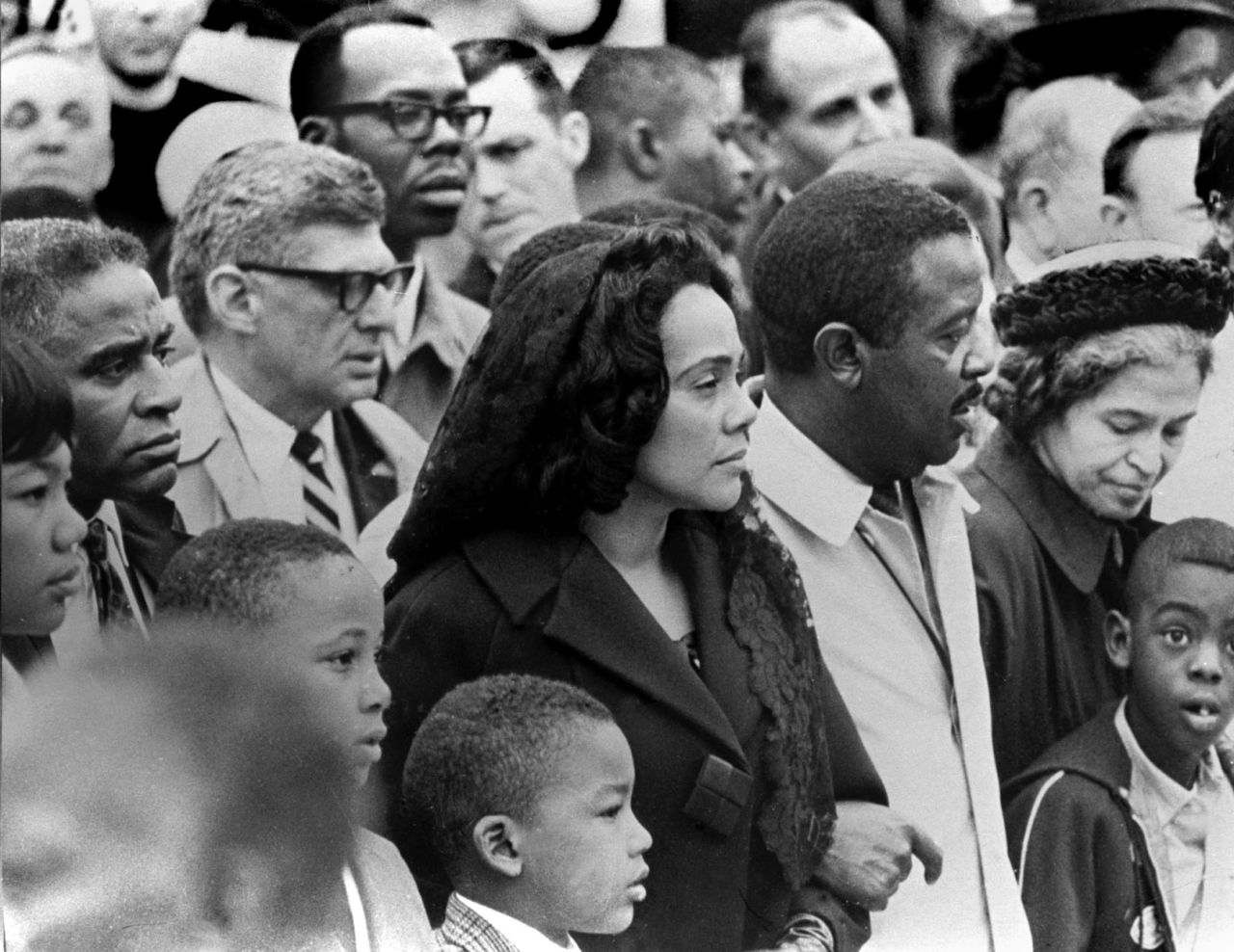 Parks, far right, joins a march through Memphis, Tennessee, on April 8, 1968 -- four days after the death of the Rev. Martin Luther King Jr. King organized the Montgomery bus boycott. His widow, Coretta Scott King, is seen at center next to the Rev. Ralph Abernathy.