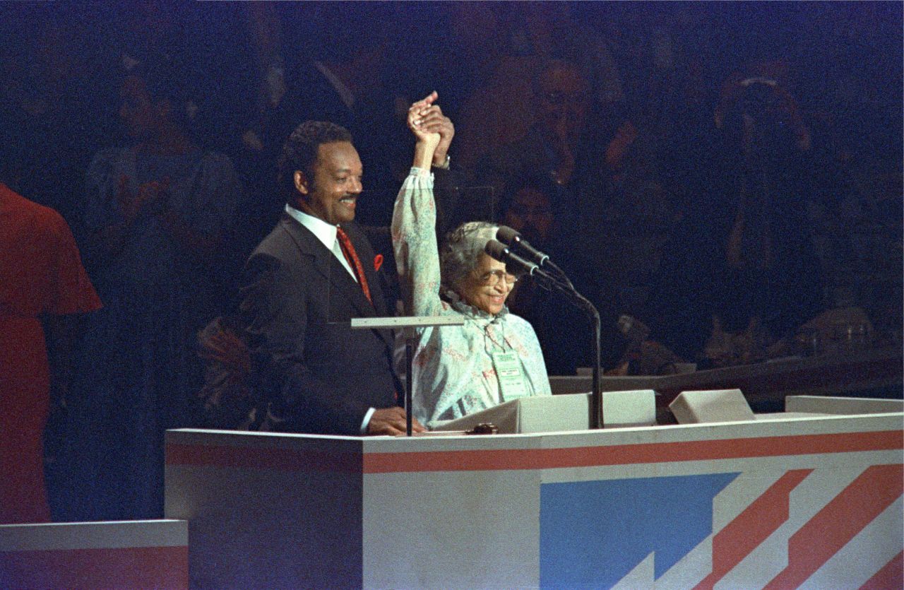 The Rev. Jesse Jackson shows solidarity with Parks at the Democratic National Convention in 1988. Jackson had been a candidate in the Democratic primaries that year.
