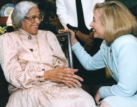 Hillary Clinton greets Parks at the White House in 1990.