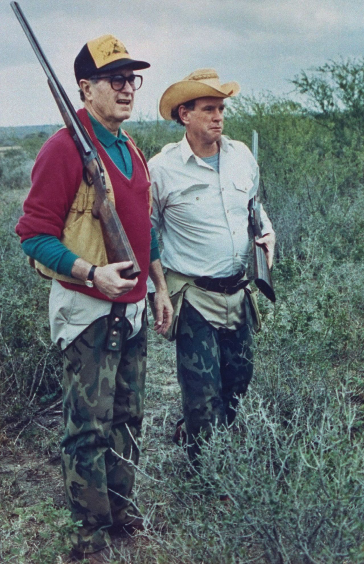 George H.W. Bush and oil heir William Farish check out a quail hunt at Lazy F Ranch in Texas in January 1989.