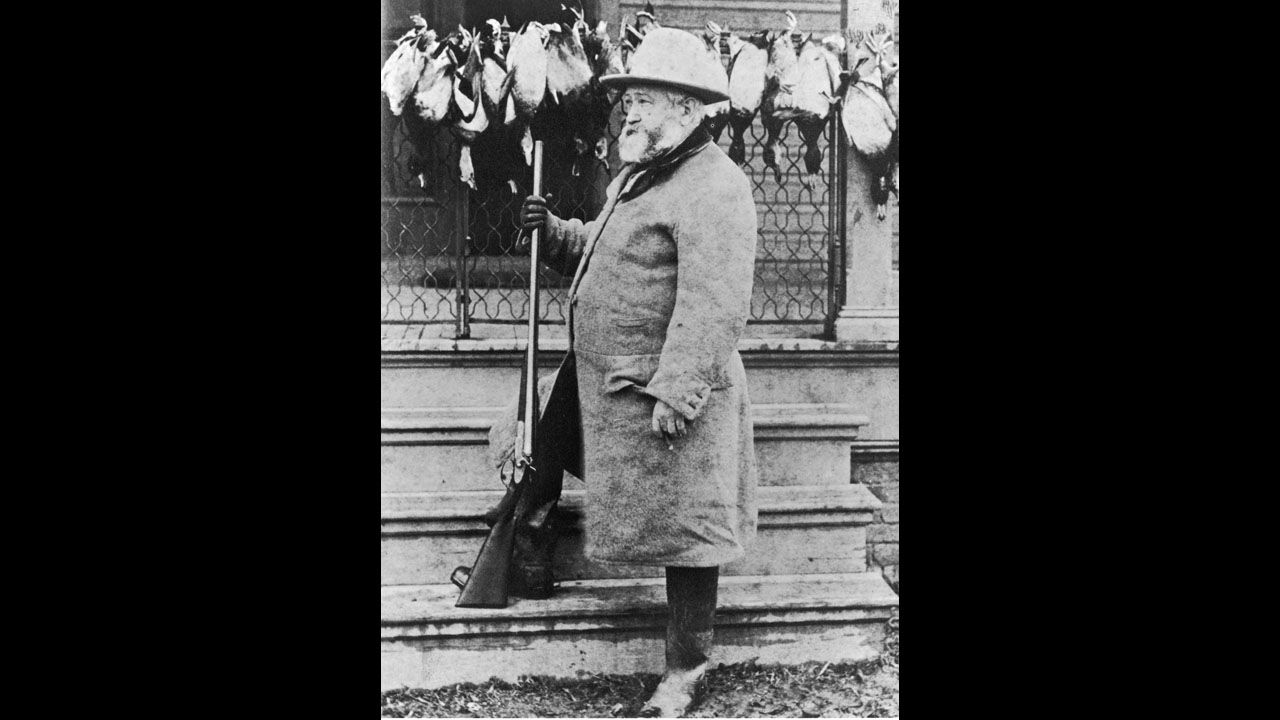 Benjamin Harrison poses with a gun in this portrait, circa 1880s. 