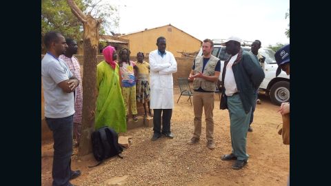 Mat Jacob, far left, meets with local leaders and partners in Konna, Mali, to assess medical and humanitarian needs.