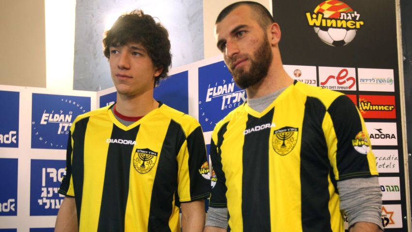 Chechen football players Dzhabrail Kadaev (L) and Zaur Sadaev, are introduced by the Beitar Jerusalem football club on January 30.