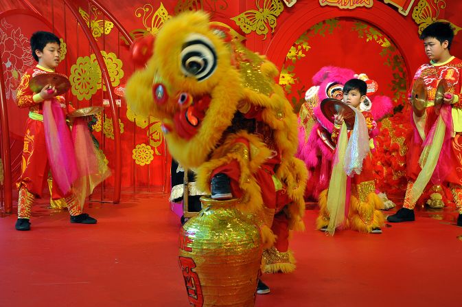 All seems fine. The lead dancer steps his or her foot on the prey. <br /><br />"Pay attention to the lion's expression," says Ha. "See how the eyes are closed when it's smelling the wine. Lion dancers will drag the wine bottle away from its original position, just as a real predator would do."