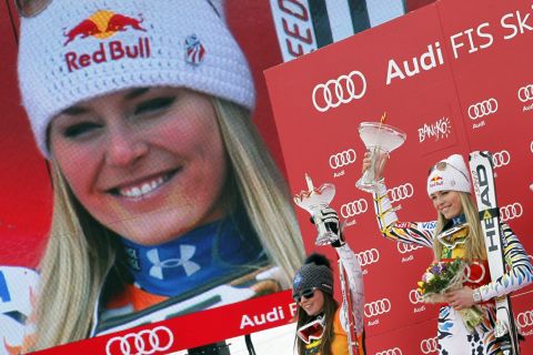 Vonn shows her first-place trophy during the Audi FIS Alpine Ski World Cup for the women's super-G on February 26, 2012, in Bansko, Bulgaria.