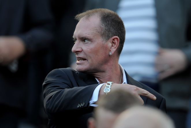 Gascoigne gestures as he watches a match between his former sides Newcastle and Tottenham at St James' Park.