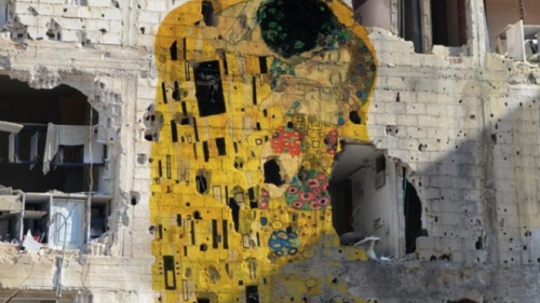 "Freedom Graffiti," by Syrian artist Tammam Azzam, is a digitally created work featuring Gustav Klimt's "The Kiss."