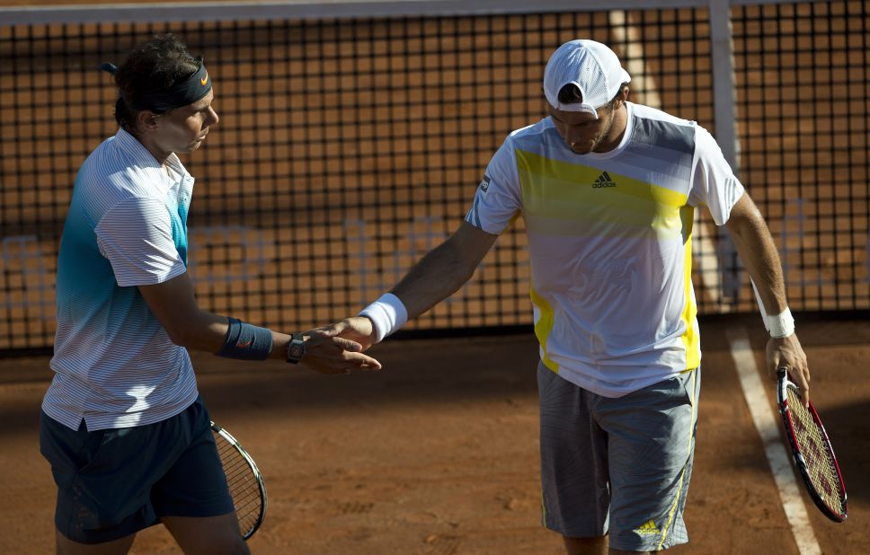 Nadal teamed up with his friend Juan Monaco to win their doubles match against Czech Republic's Frantisek Cermank and Lukas Dlouhy in a Chilean claycourt event.