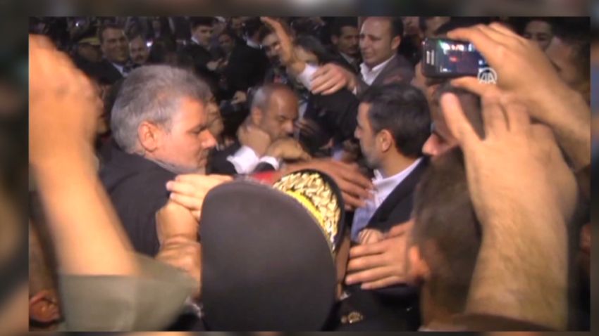 vo egypt ahmadinejad hit by shoes_00003401.jpg