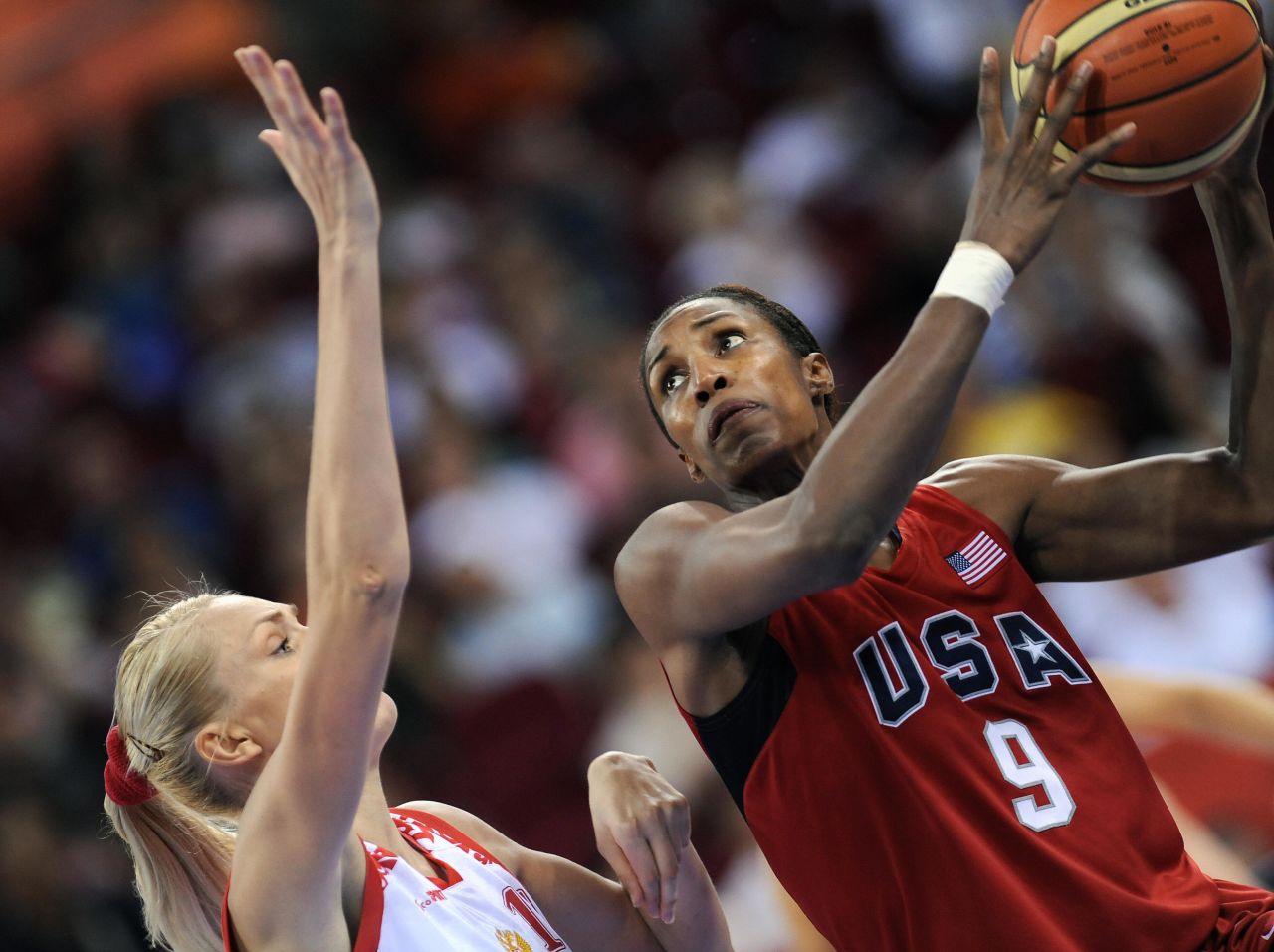 Lisa Leslie (#9) won four Olympic gold medals with the U.S. before retiring from basketball in 2009. 