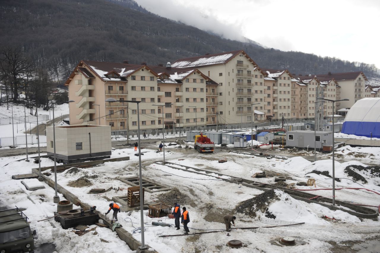The total cost is expected to top $50 billion, with much of the infrastructure being built from scratch. This picture taken on January 24 shows a view of a new hotel constructed near a railway station between Adler and Krasnaya Polyana Olympic venues in the Caucasus Mountains.