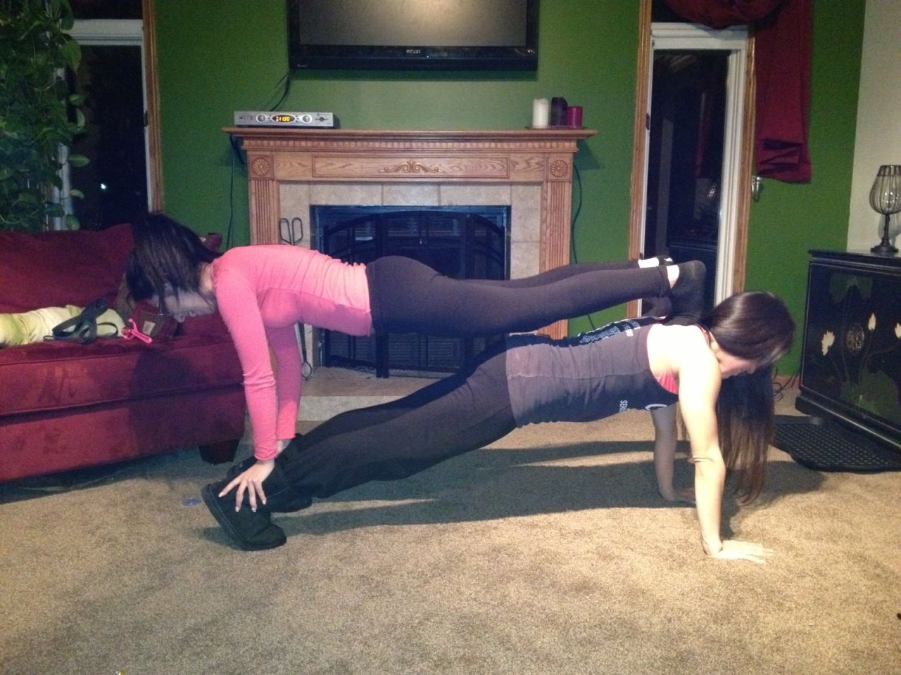 Garcia and her sister Savannah Rae Garcia motivate each other daily, Garcia says. Here they do a double plank together.