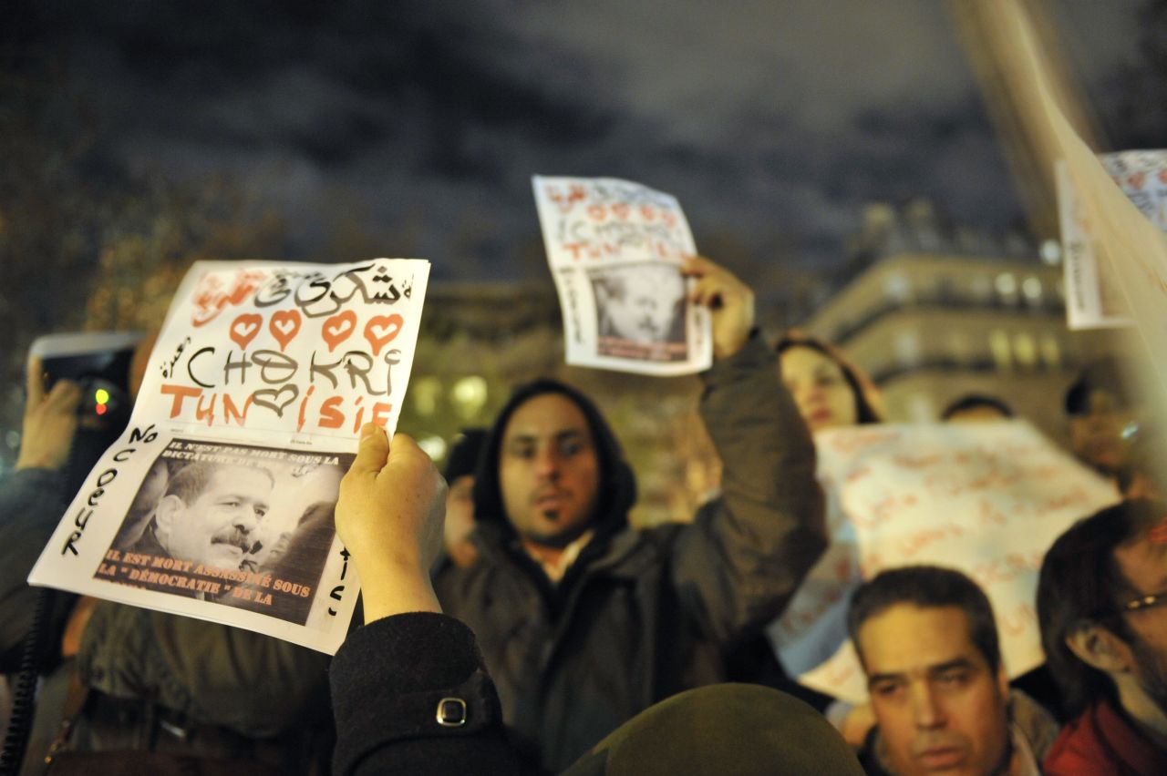 Protesters demonstrate on February 6, 2013 outside the Tunisian embassy in Paris against the killing of Chokri Belaid. 