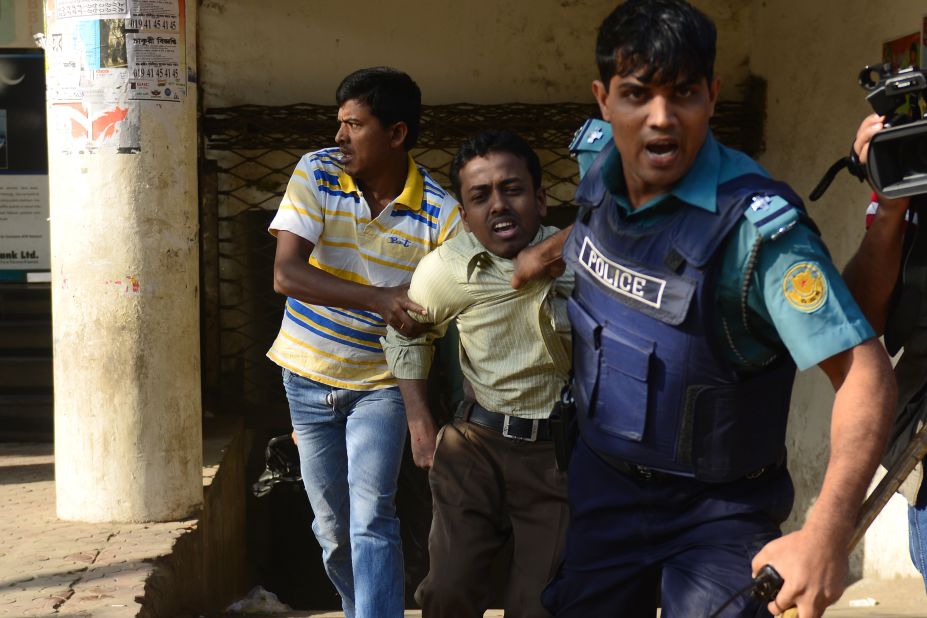 Bangladeshi police detain a suspected Jamaat-e-Islami activist during a nationwide strike in Dhaka on February 6.