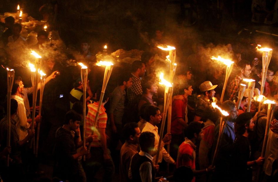 Bangladeshi social activists and bloggers participate in a torch-lit rally on February 6 in Dhaka.