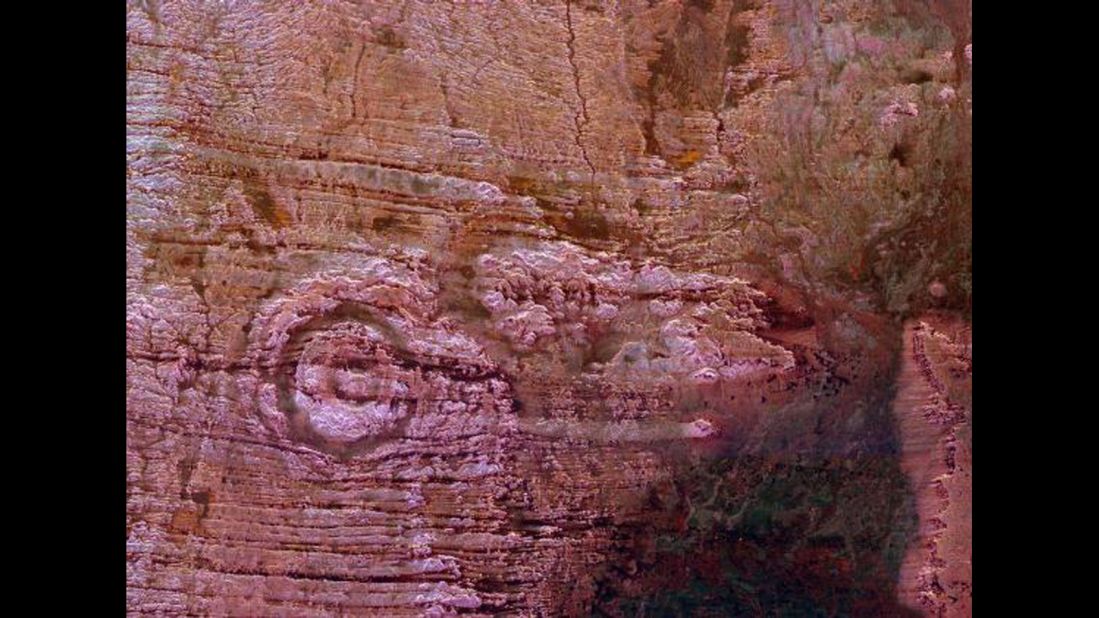 NASA scientists say the impact of an asteroid or comet several hundred million years ago created the Aorounga crater in the Sahara Desert of northern Chad. The crater has a diameter of about 10.5 miles (17 kilometers). This image was taken by the Space Shuttle Endeavour in 1994.