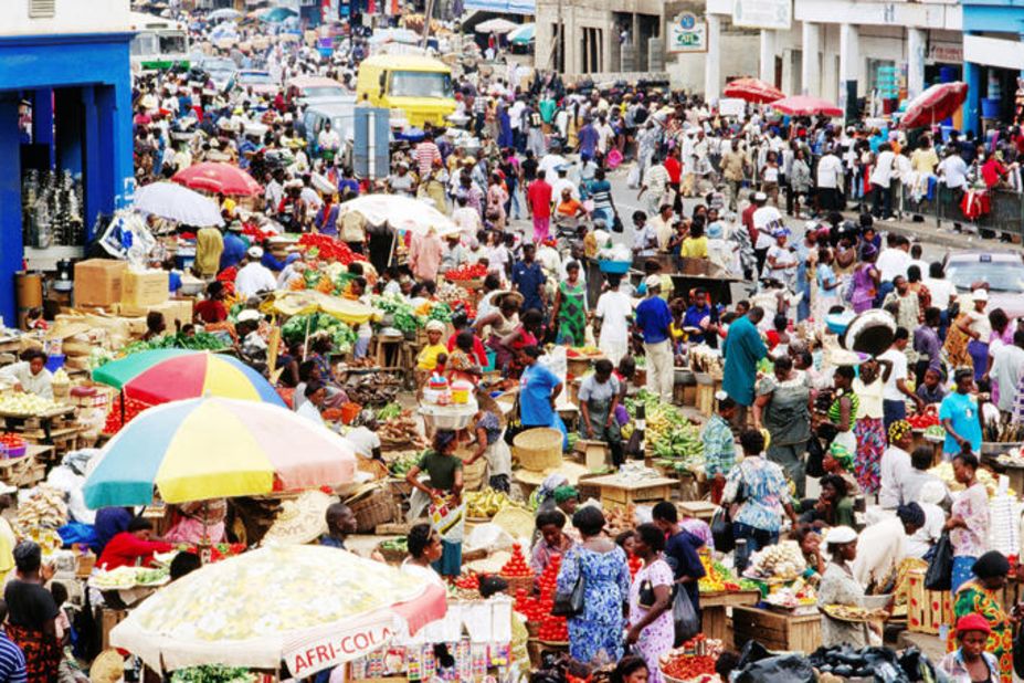 Traders ply their wares at Makola Market, Accra's main market and shopping district.