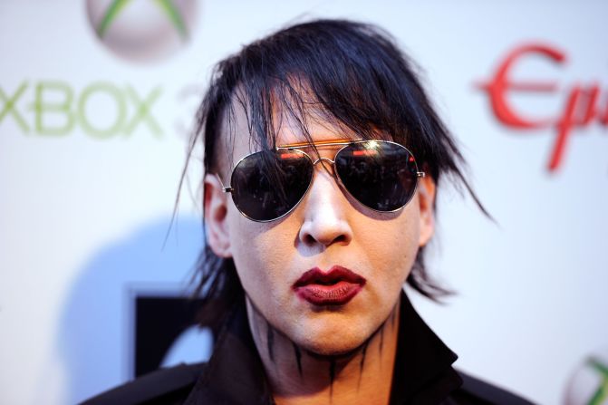 Marilyn Manson is way out there, but he did not have a rib removed so that he could more easily ... pleasure himself. 