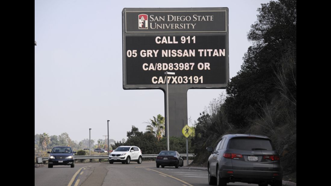 An illuminated sign at San Diego State University along Interstate 8 displays information about Dorner's last known vehicle on February 7.