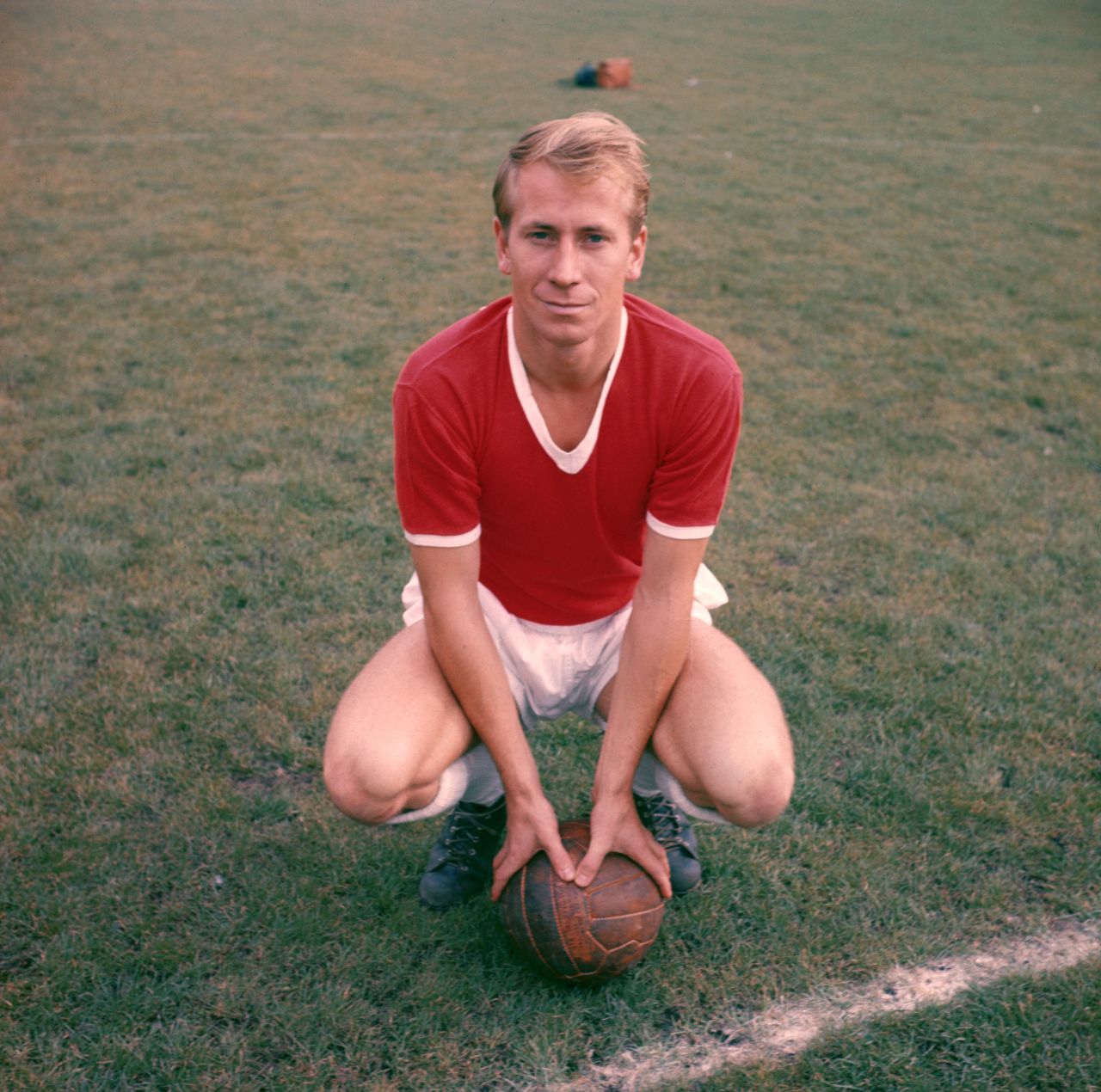 After survivng the Munich Air Crash at the age of 20, Bobby Charlton went on to become both a local and national hero for club and country. He scored 249 goals in 758 appearances for Manchester United during a 17-year playing career. He won three league titles, the 1963 FA Cup and 1968 European Cup. He was also a key member of the England side which won the World Cup on home soil in 1966 and he remains the country's top scorer to this very day with 49 international goals.
