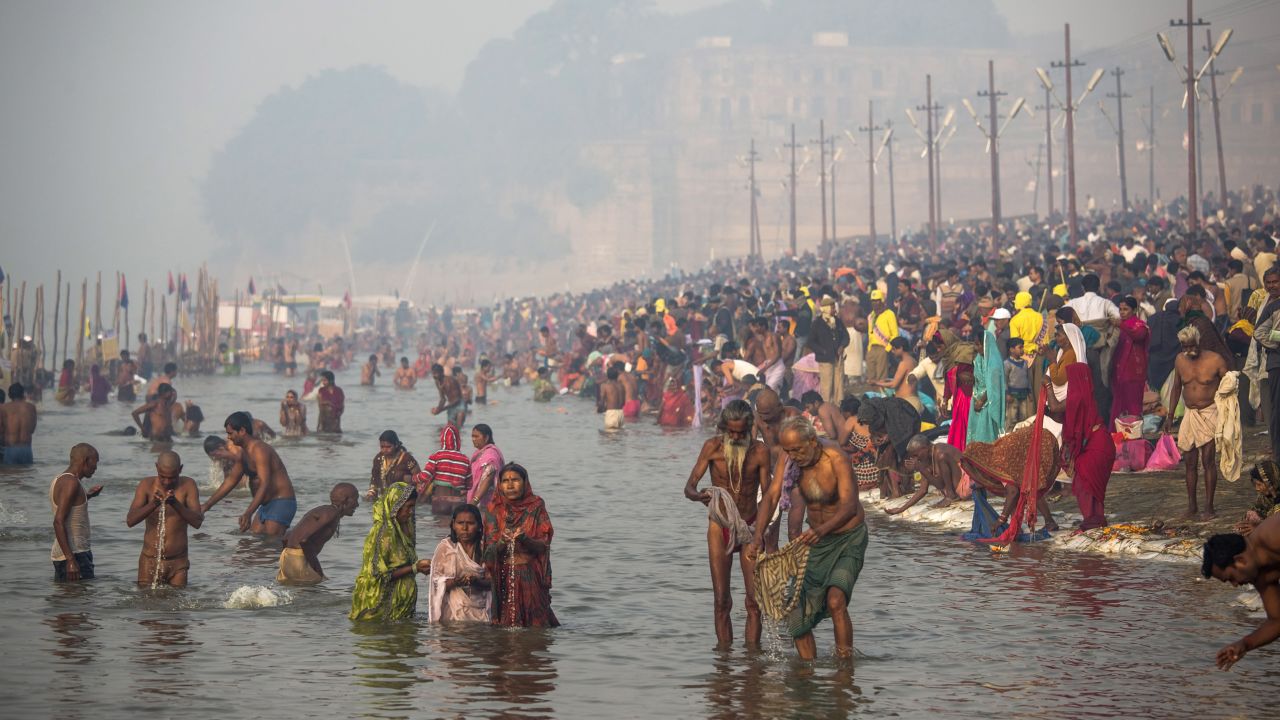 Hindu devotees bathe in the waters of Sangam on January 15.