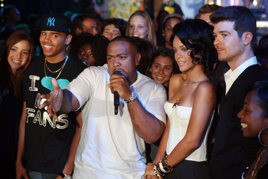 In August 2007, Brown and Rihanna joined Timbaland, center, and Robin Thicke onstage during MTV's "Total Request Live" in New York  