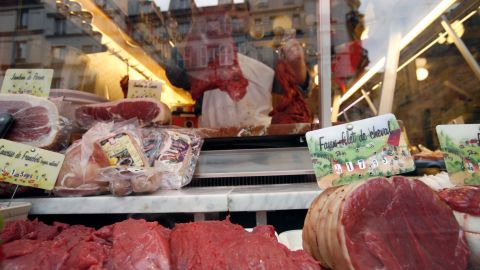 A butcher prepares meat at his horse-meat shop in Paris in January 2007.