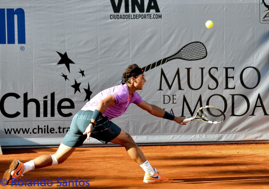 About a half an hour into the match, Nadal chased a ball sideways across the court and slid on the clay surface but kept his balance. The look on his face as he came to a stop was a five-second blur of emotions. He looked wide-eyed at his knee as if expecting pain or a problem, before a trace of a smile crossed his face. He turned towards his opponent, his body language signaling "game on."