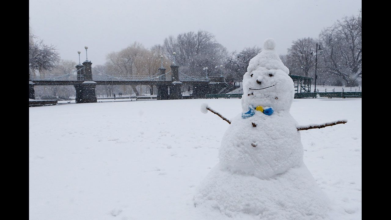 A snowman sits on the duck pond in the Boston Common.