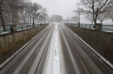 Memorial Drive sits empty following a driving ban and state of emergency that was issued in Boston on Friday.