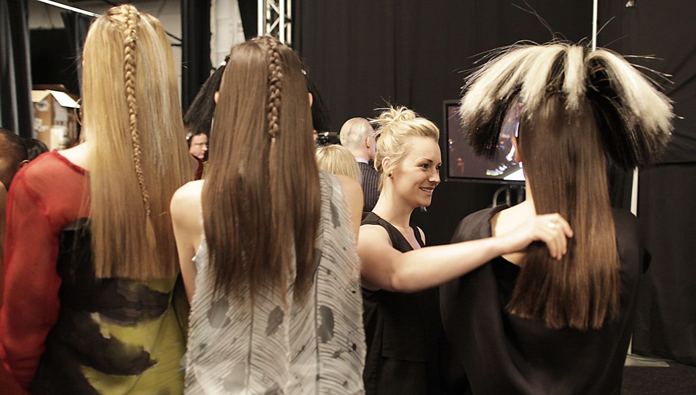 Backstage, "Project Runway" models get prepared on February 8.