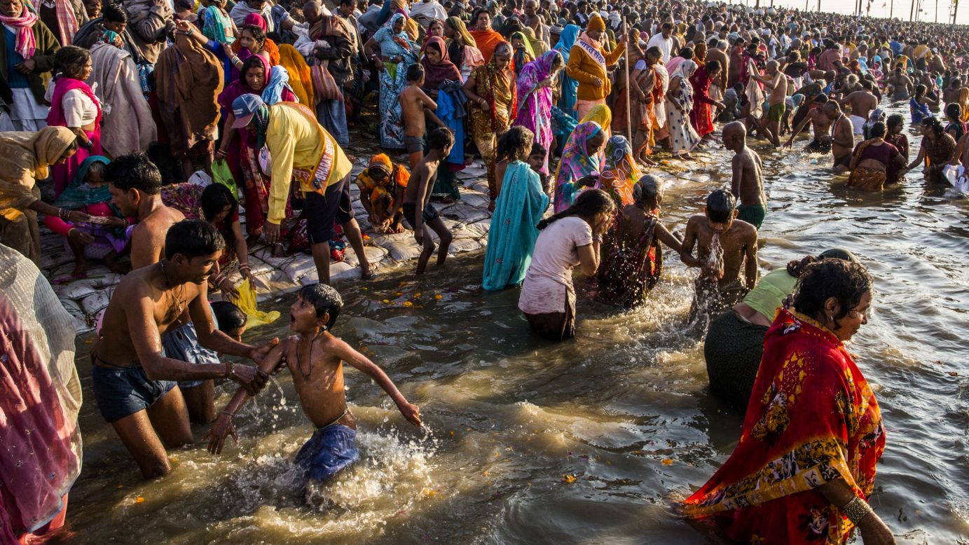 Hindu devotees bathe on the banks of the Sangam on February 9.