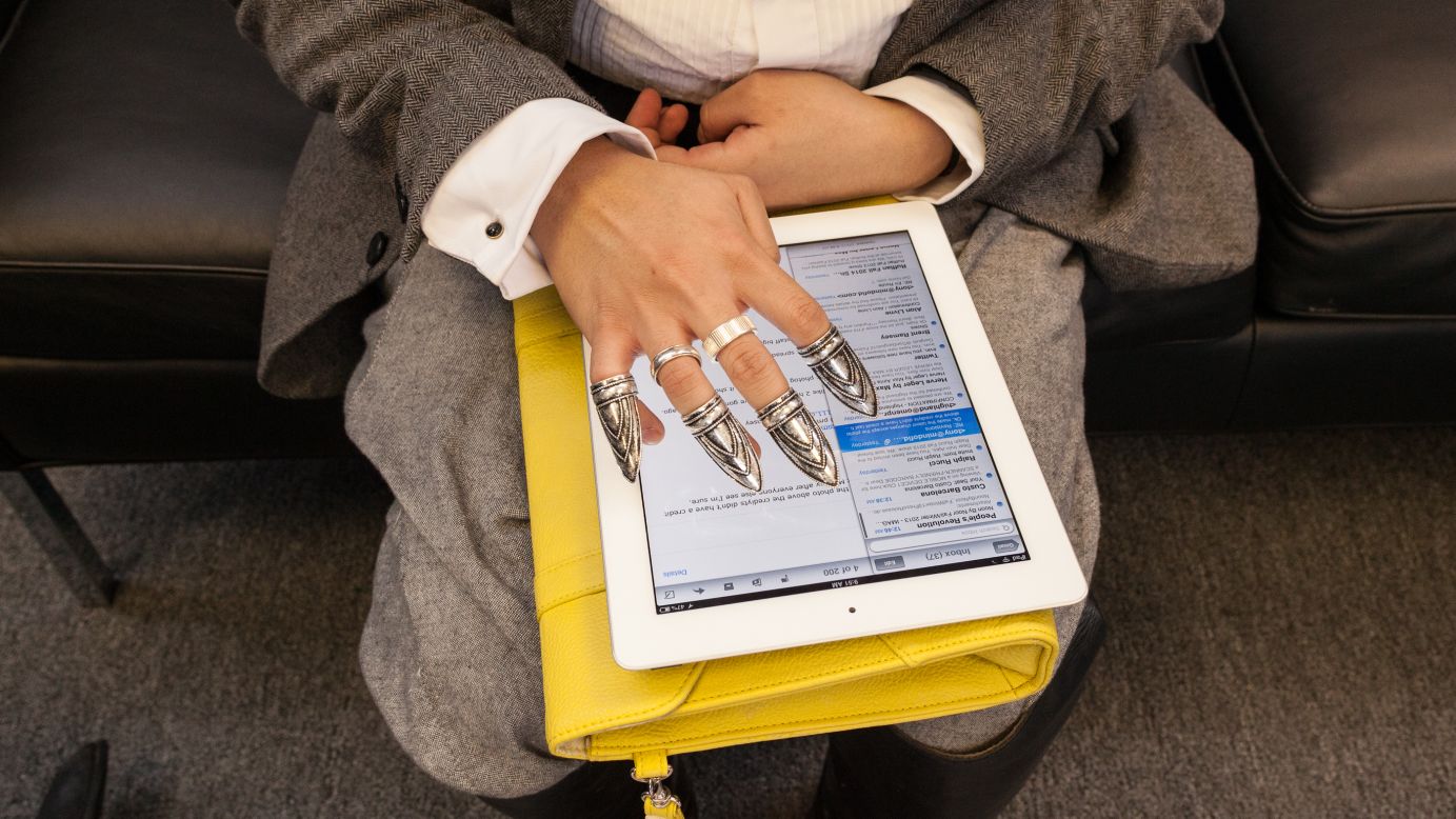 A fashionable iPad user checks e-mails on February 9.