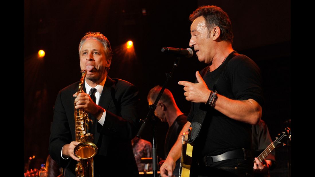 Host John Stewart and Springsteen goof around onstage.