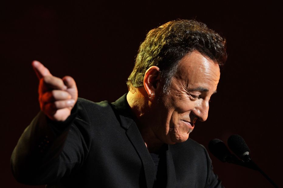 Springsteen gestures during his acceptance speech.