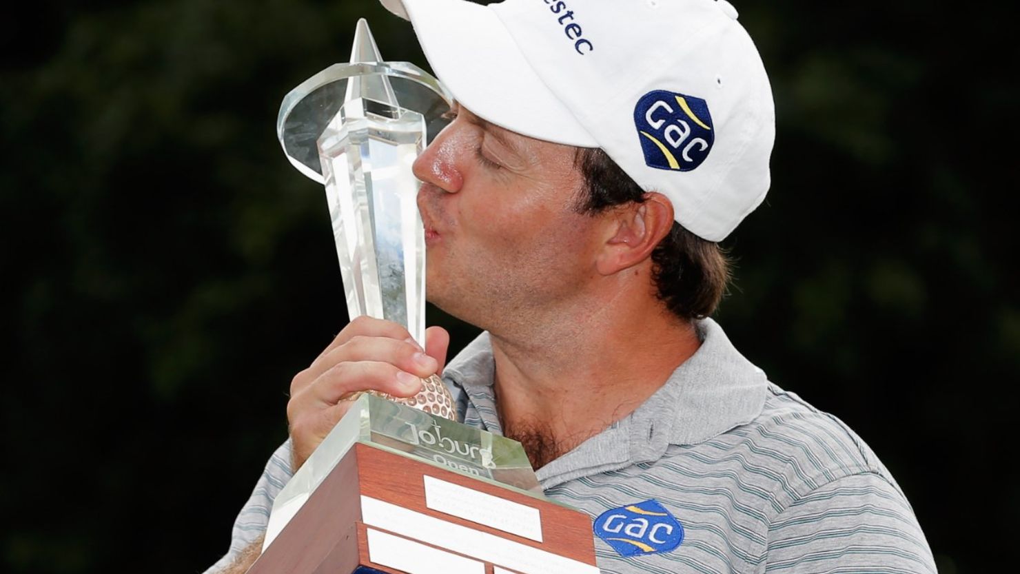 South African golfer Richard Sterne savors his victory at the Joburg Open on Sunday, having also won it in 2008.